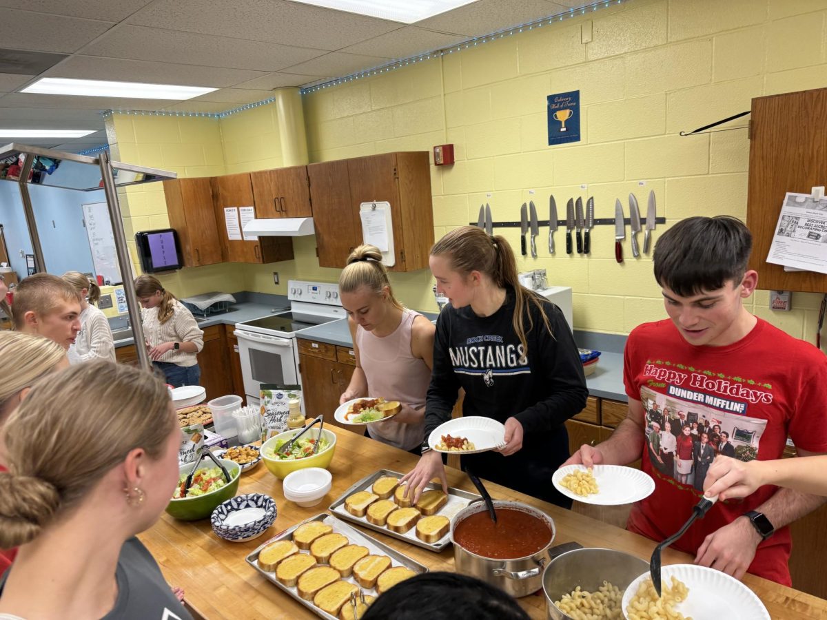 FCCLA members debate what they will 
choose between all the amazing food. 
