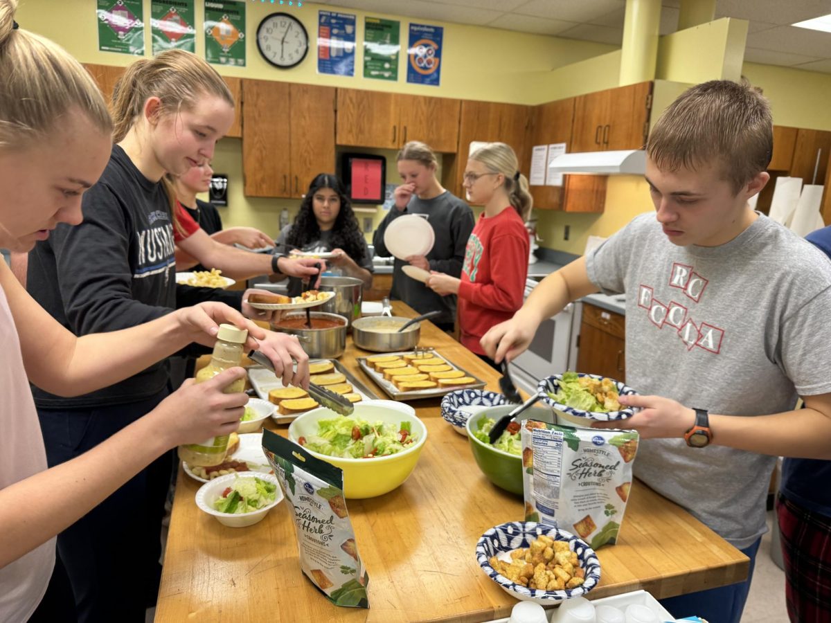 FCCLA members dig into an after-school potluck. 