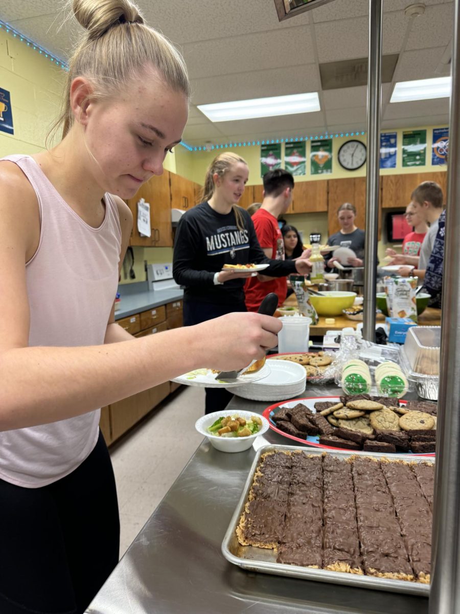 Peyton Rottinghaus picks up some fresh snacks. 