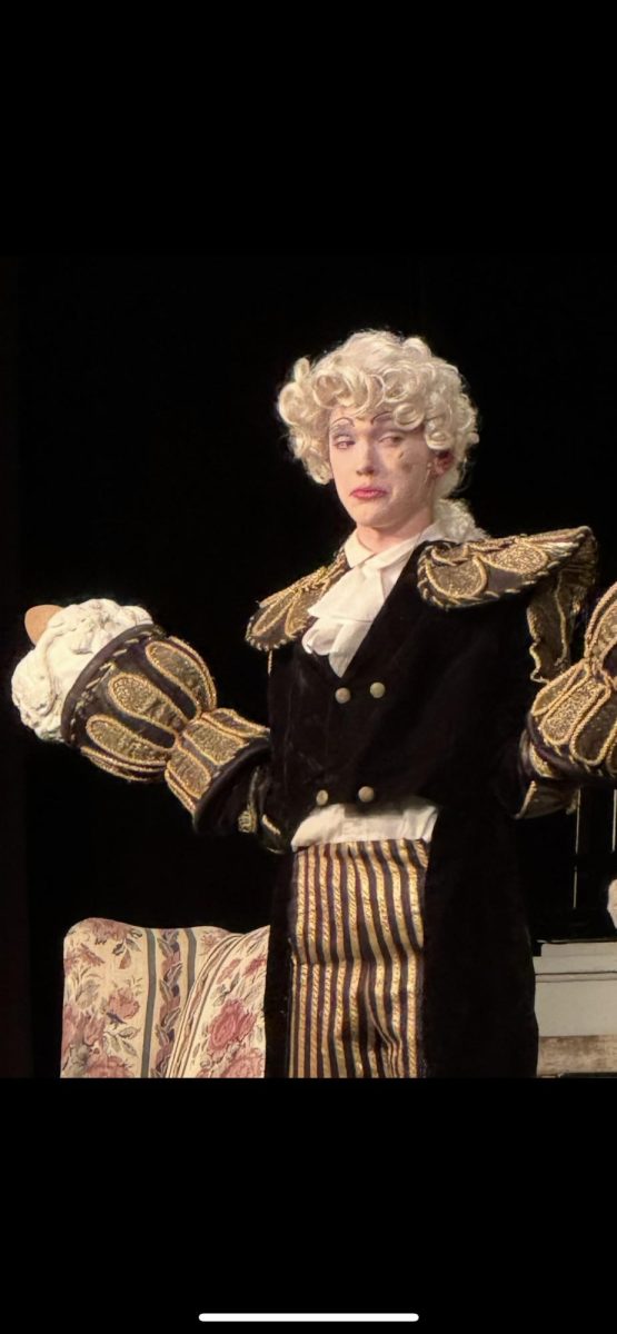 From lighting up the stage as Lumiere in Beauty and the Beast to chasing the Hollywood spotlight, Gavin Smith as Lumiere reacts to Cogsworth in the Rock Creek High School production of "Beauty and the Beast" in November of 2024.