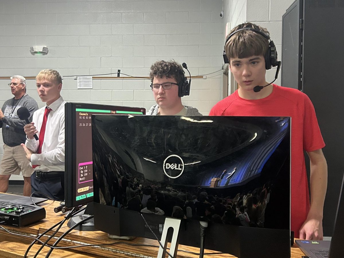 Focused and ready: Rock Creek 5B Broadcasting students check the controls just moments after going live for the principal candidate forums. Senior Joe McFall and juniors Braden Miller and Nate Bortnick make sure all systems are go for the student-led principal candidate forum held on March 2 in the commons of the high school. This was the broadcast class students' first time to produce a compeletely student-led live stream for our school. 