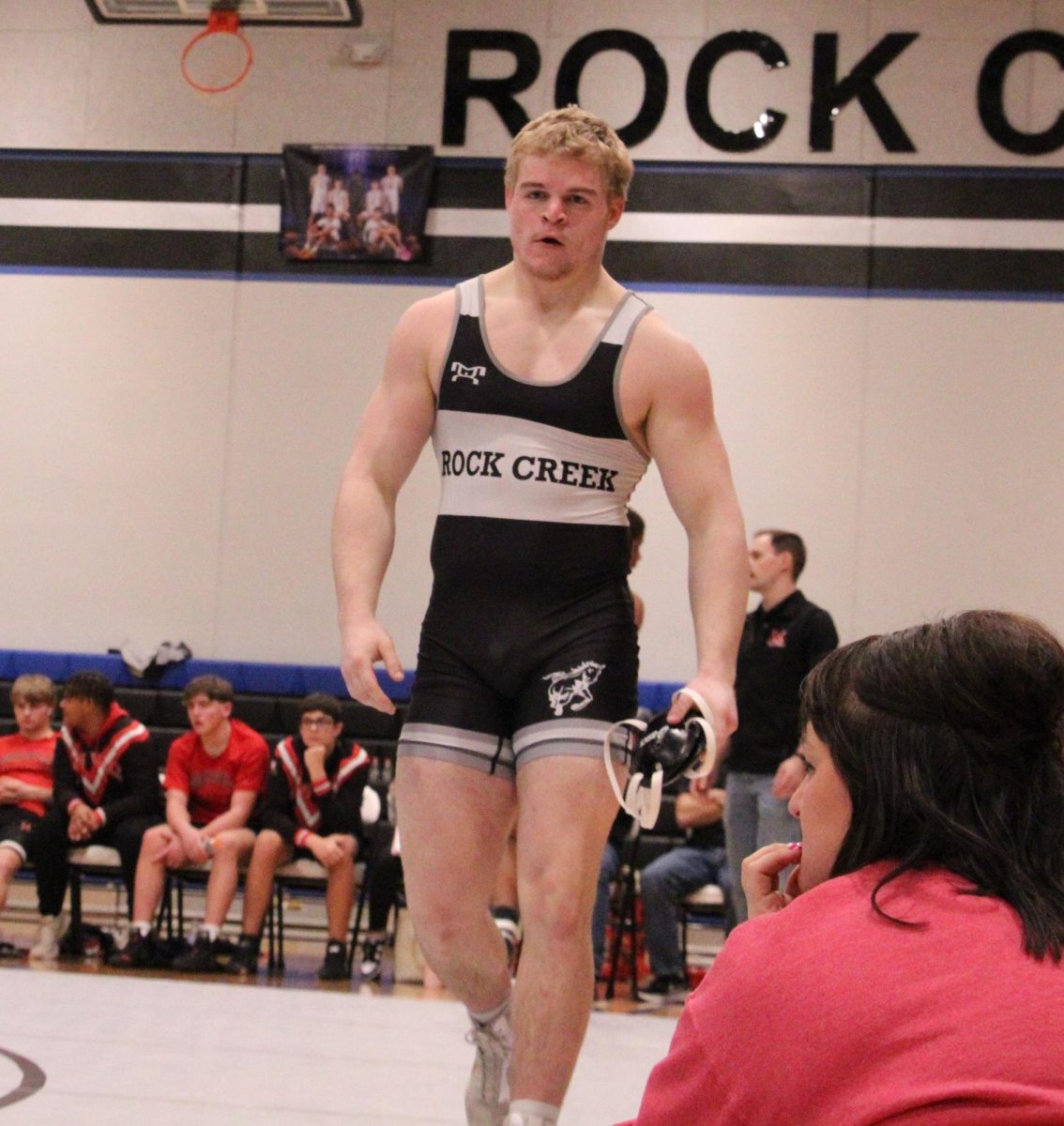 Stepping off the mat after a hard-fought match, Senior Wade Rottinghaus wins with the determination of a competitive wrestler on his senior night dual. This was his last home dual of his senior year on Feb 10.