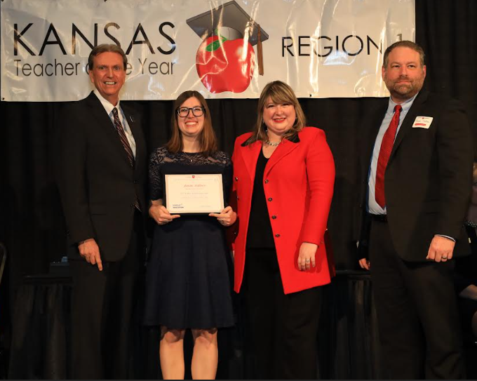 From left to right Dr. Randy Watson  (Kansas Department Of Education), Jenette Follmer (Rock Creek English Teacher0, Rachel Marlow (2026 Kansas Teacher of the Year) and Aaron Tallen (Security Benefit, a partner sponsor of KTOY).